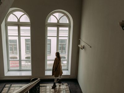 Silhouette of a person in a balance pose.